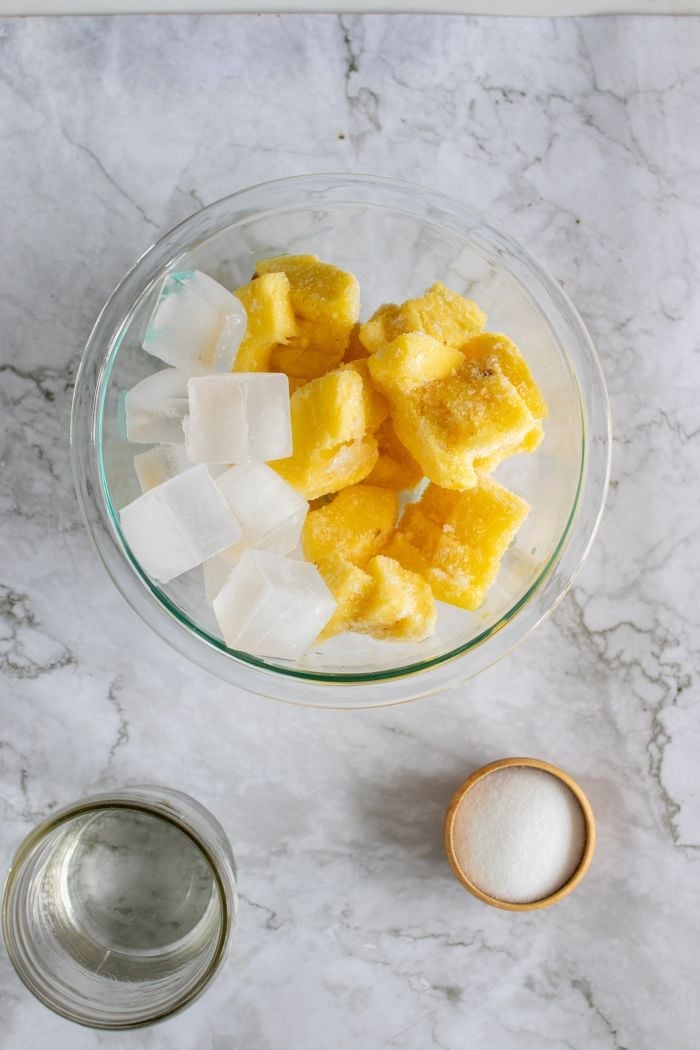 pineapple, ice, water and sugar are shown